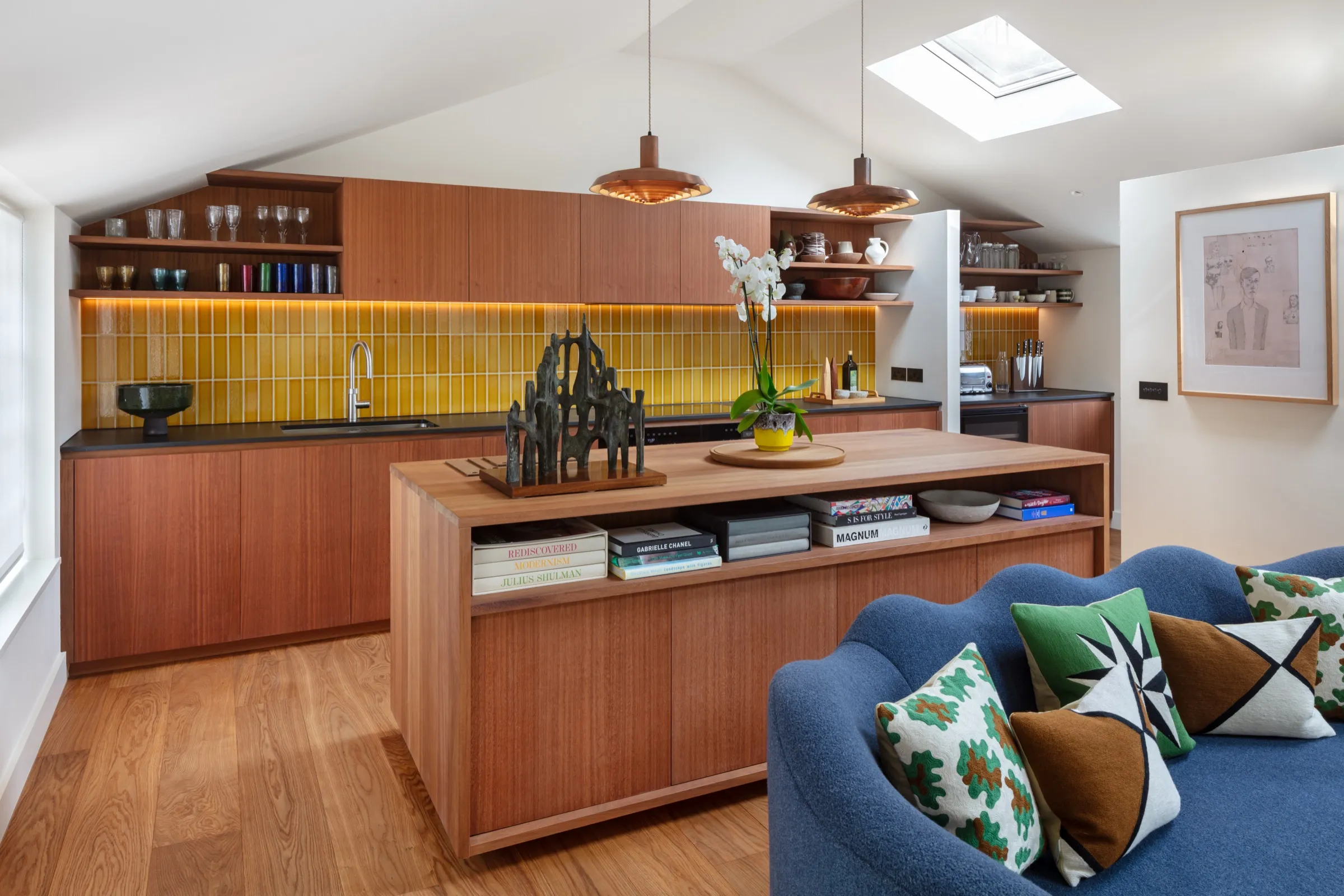 Kitchen with timber cabinetry and yellow tiled splashback