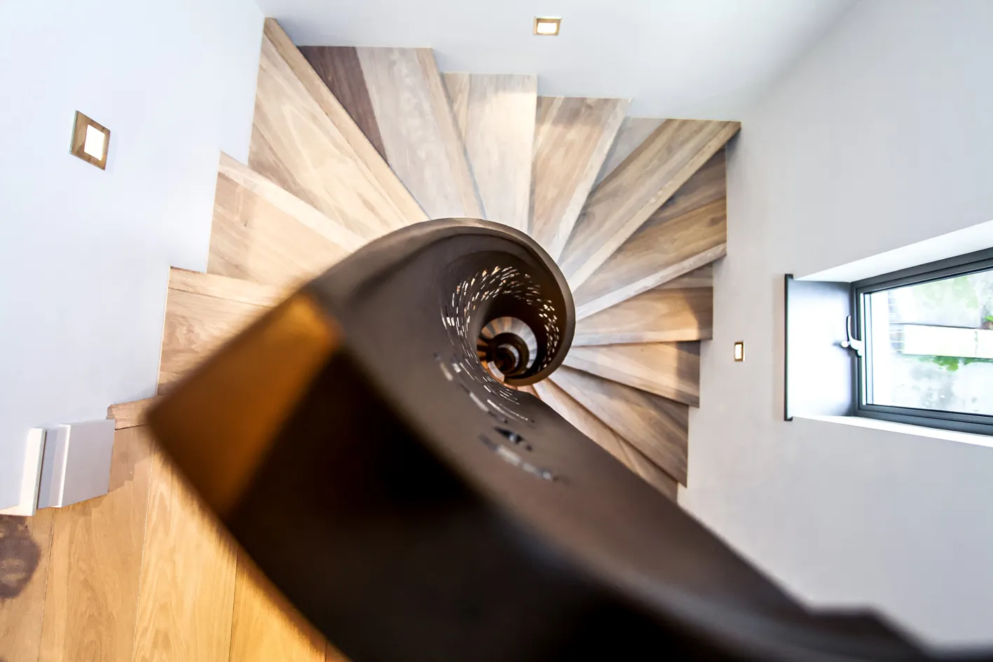 Spiral oak staircase seen from above