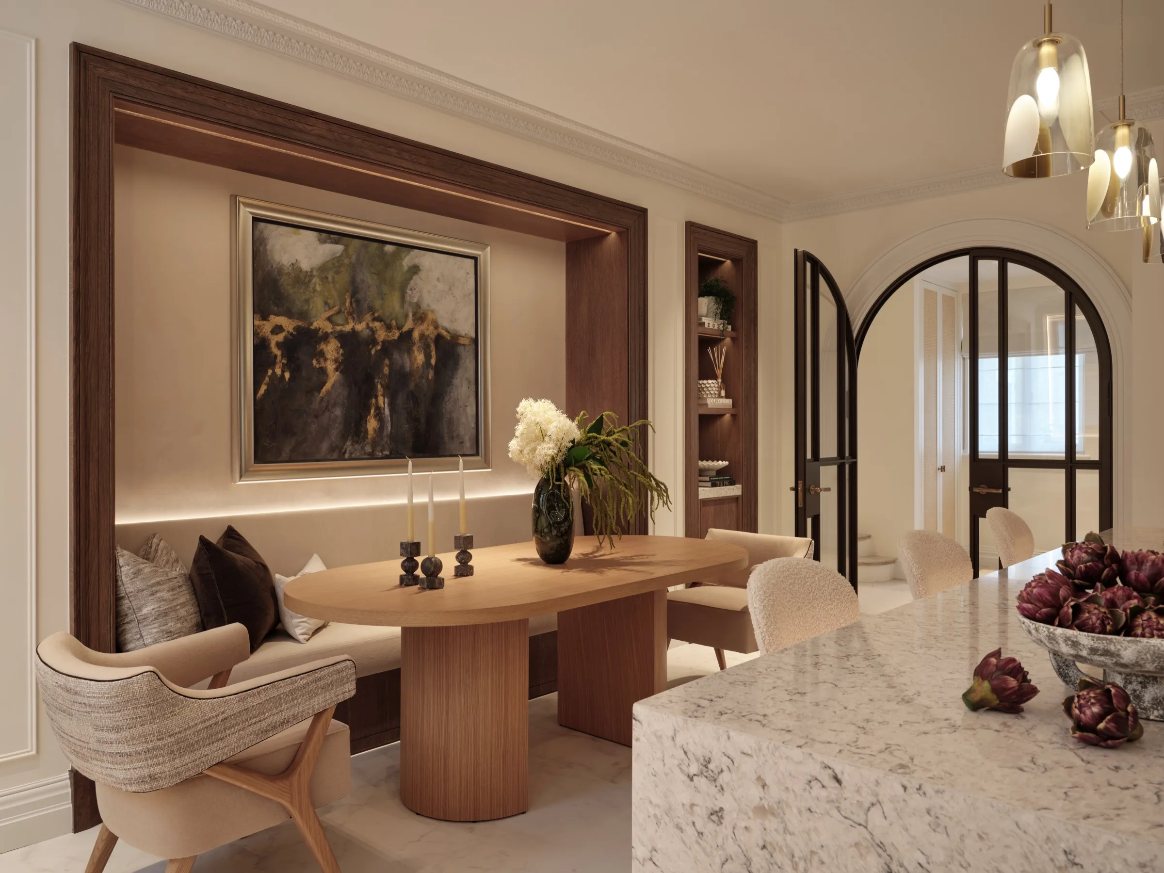 Dining area with banquette, panelled recess and arched glazed doors