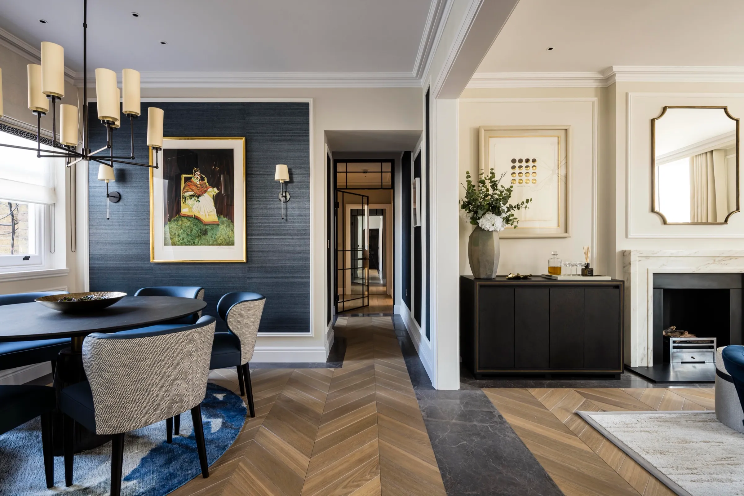 Dining area with herringbone parquet and view down the hallway