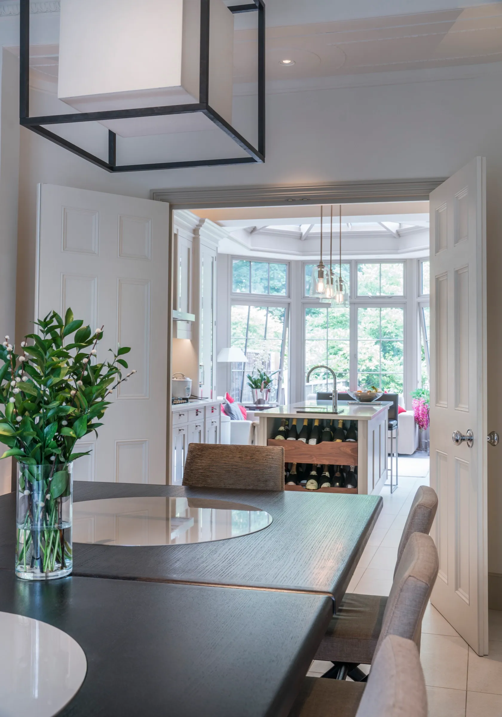 Dining table with view through to the bay window