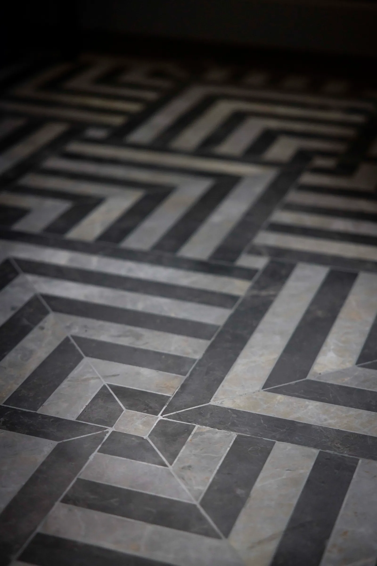 Geometric inlaid stone floor detail