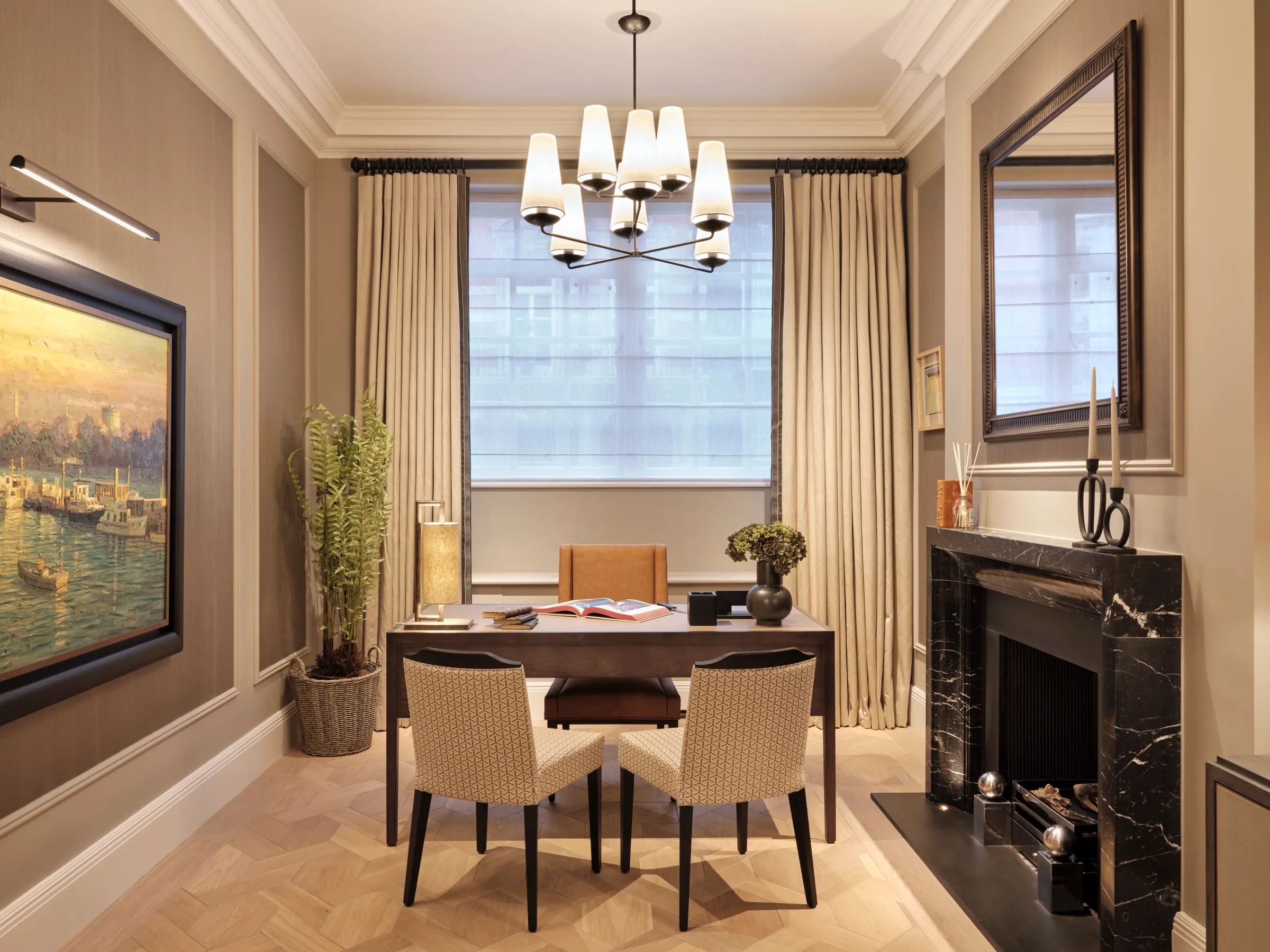 Panelled study with black marble fireplace