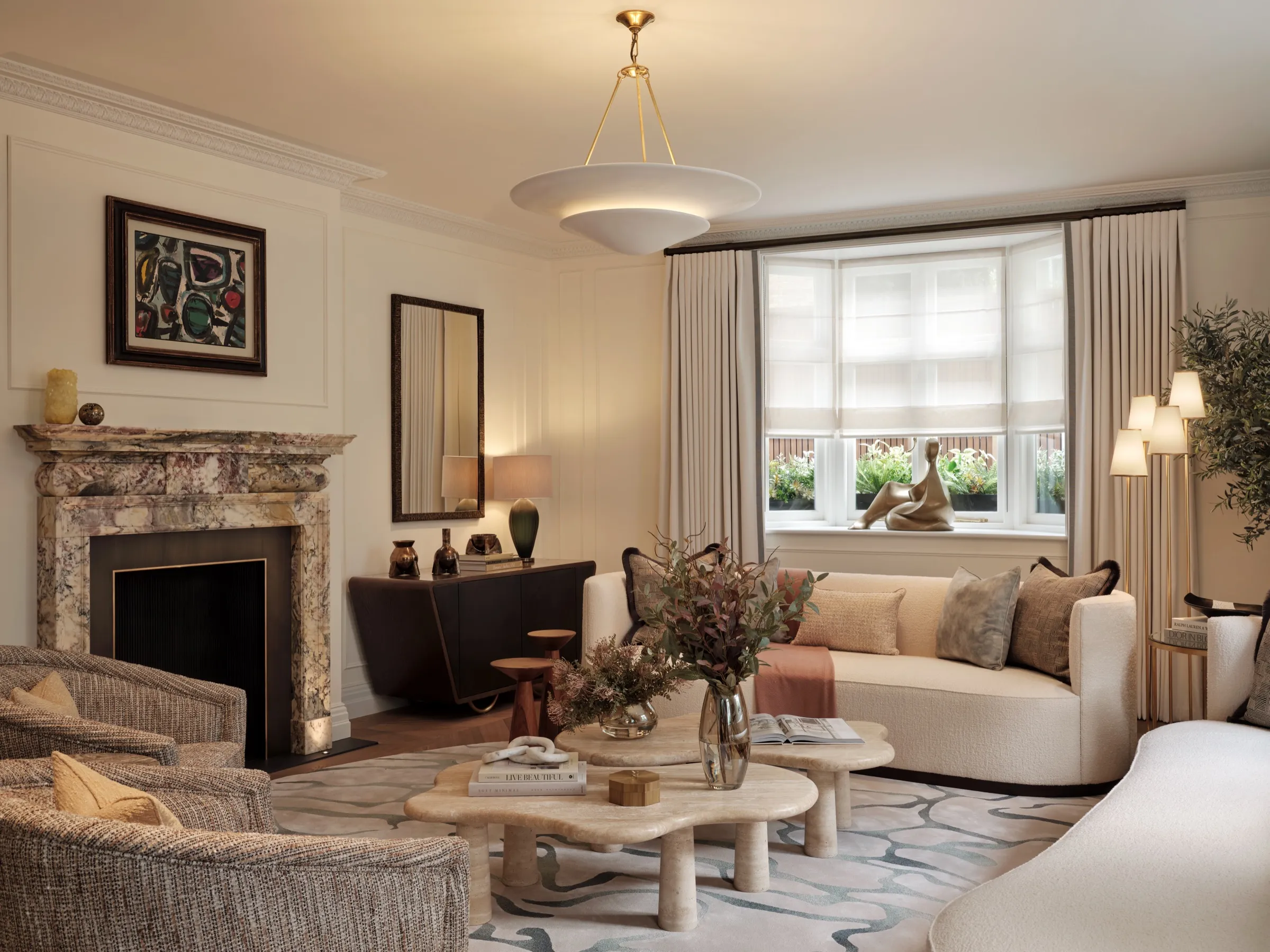 Drawing room with marble fireplace and bay window