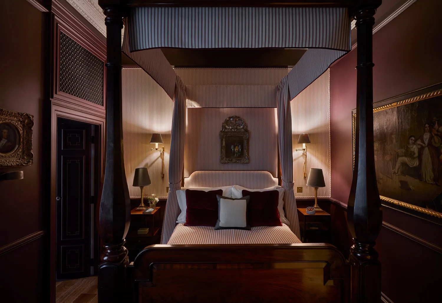 Panelled bedroom with four-poster bed