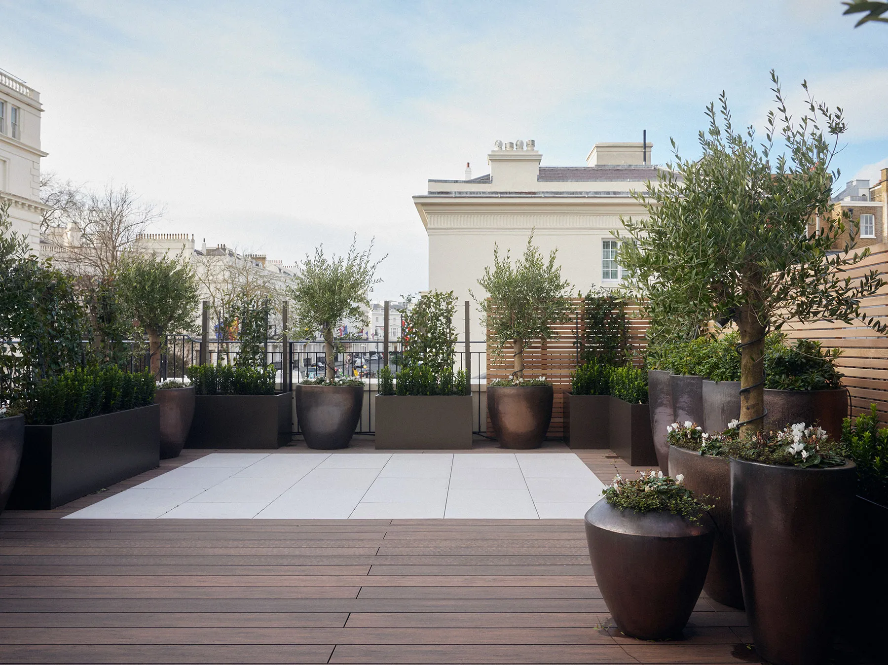 Roof terrace with timber decking and planters