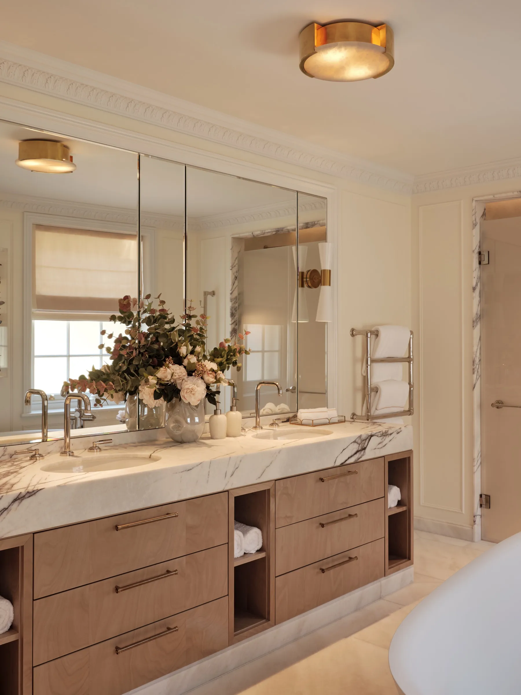 Bathroom with marble-topped timber vanity and mirrored wall