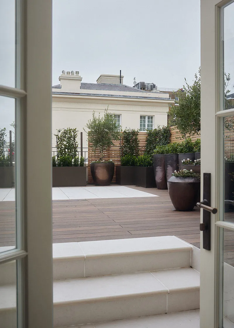 French doors opening onto the roof terrace