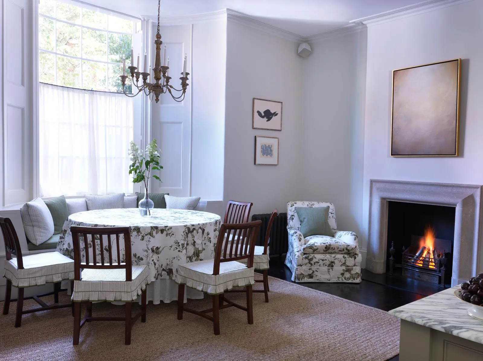 Breakfast room with fireplace and banquette