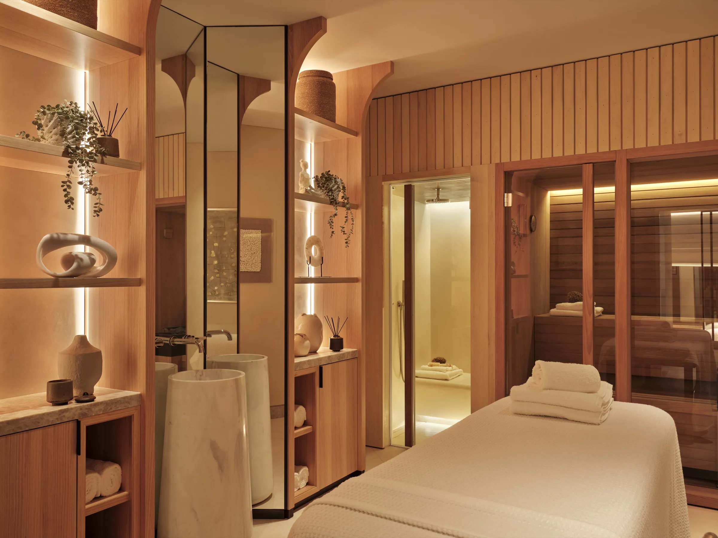 Spa treatment room with timber panelling and sauna