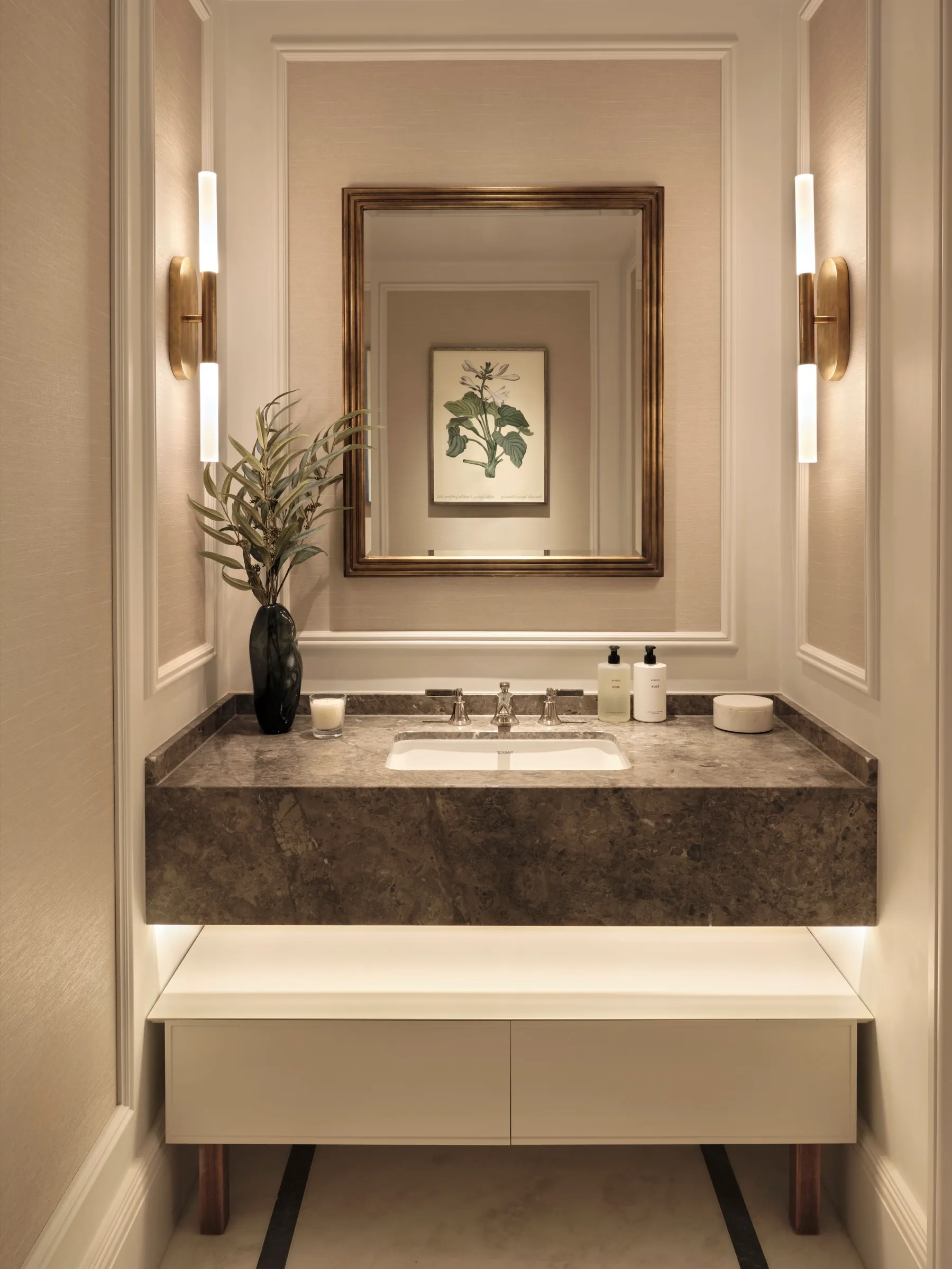 Cloakroom with stone vanity and panelled walls